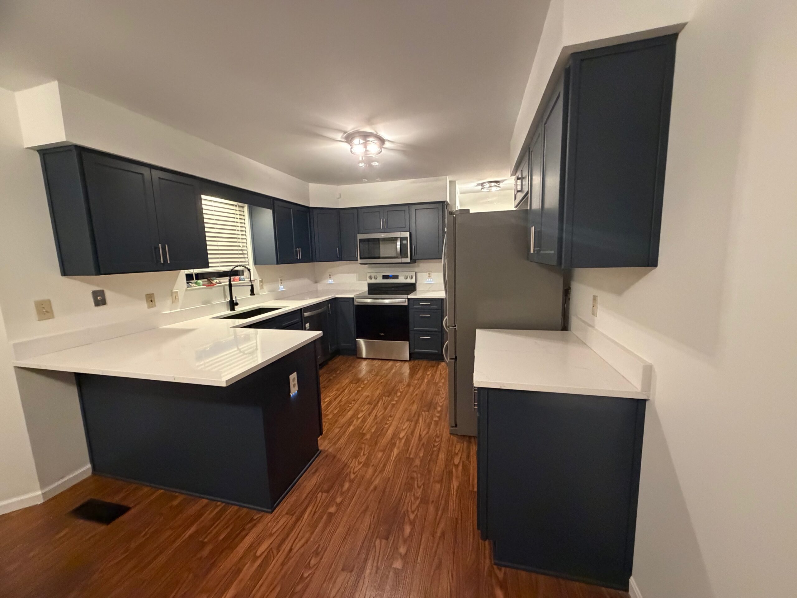 Refaced cabinet doors and drawer fronts